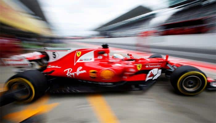 Japanese Grand Prix: Sebastian Vettel sets early pace from Lewis Hamilton in Suzuka