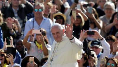Pope Francis tells web companies: use profits to protect children
