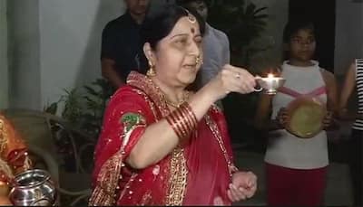 Draped in red, EAM Sushma Swaraj celebrates Karva Chauth - WATCH