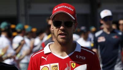 Japanese Grand Prix: Sebastian Vettel reprimanded for anthem absence