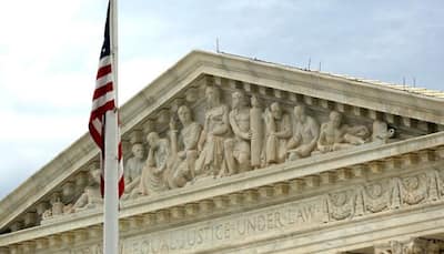 US Supreme Court throws out travel ban ruling