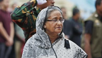 Bangladesh issues warrants for opposition leader's arrest