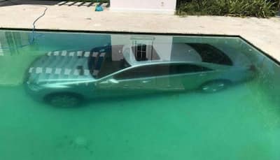 Dumped at dinner, girl drives boyfriend’s Mercedes into pool