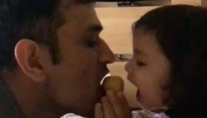 Watch: MS Dhoni and daughter Ziva&#039;s attack on &#039;besan ka laddoo&#039;