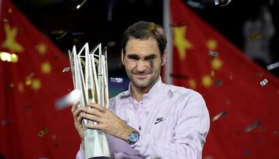 Roger Federer brushes aside Rafael Nadal to win second Shanghai Masters title 