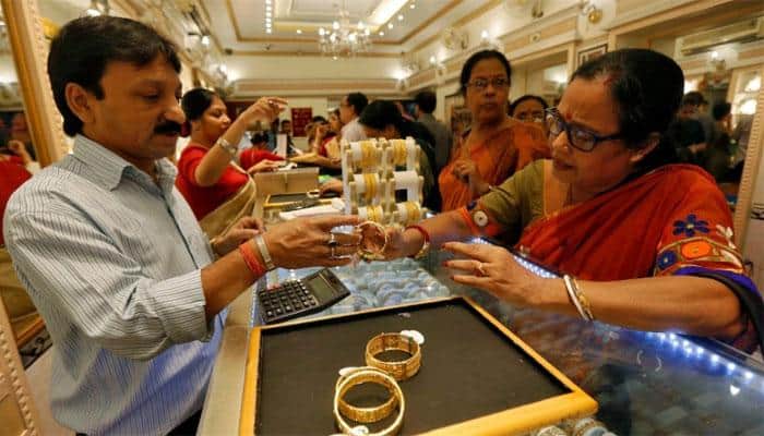 Gold price sparkles on Diwali demand, tops Rs 31,000-mark 
