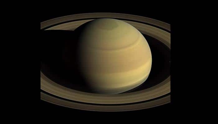 Seven moons work together to keep Saturn's largest ring in place