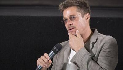 Brad Pitt eyeing Angelina Jolie's lookalike