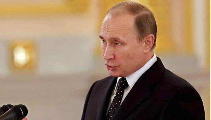 Russian President Vladimir Putin threatens retaliation if RT channel is targeted by US