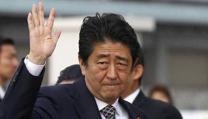 Japan PM Shinzo Abe targets North Korea after storming to `super-majority` vote win