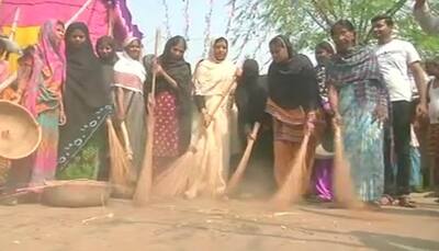 Chhath Puja: Muslim women clean roads leading to Ganga ghats in Patna