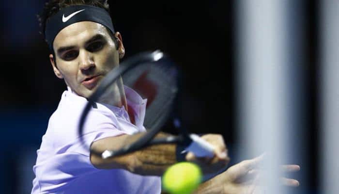 Roger Federer routs Frances Tiafoe in Basel opener