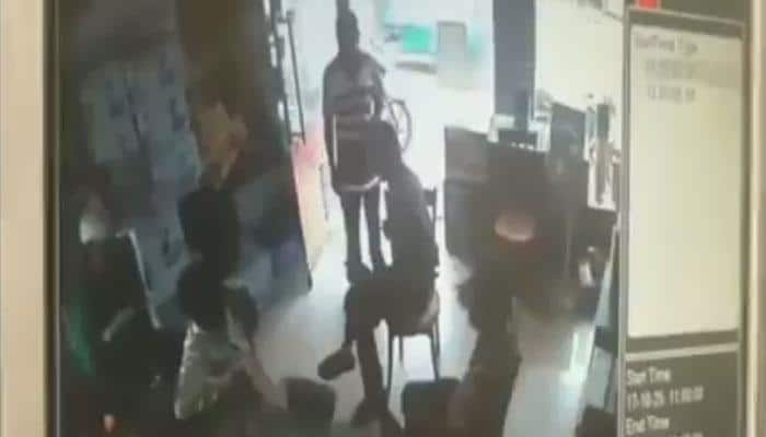 WATCH: Mobile phone emits smoke, leaves man injured in West Bengal