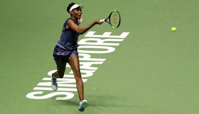 Patient Venus Williams rises over improved Caroline Garcia at WTA Finals