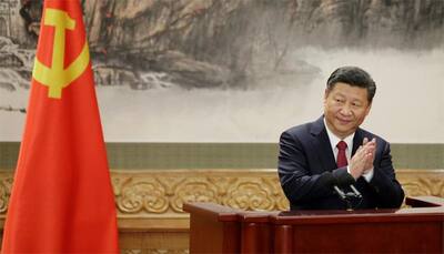 China's Xi Jinping says hopes to promote relations with North Korea 
