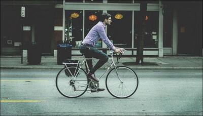 Overweight and no time for gym? Ride a bike to work, suggest researchers