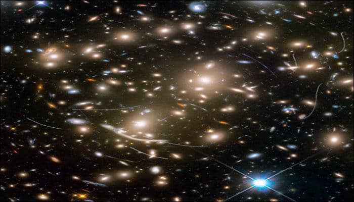 NASA&#039;s Hubble captures distant galaxies as asteroids photobomb them - See pics
