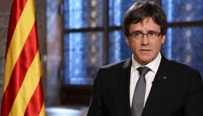 Catalonia's Puigdemont, allies freed with conditions in Belgium