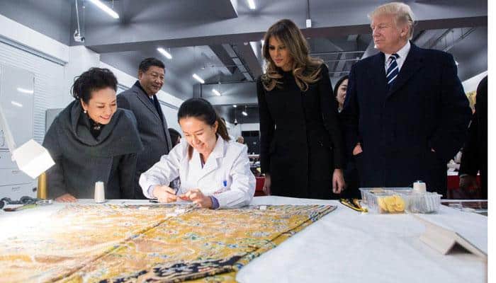 First lady Melania plays tourist as Trump departs Beijing