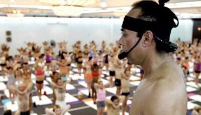 Bikram Choudhury Yoga, studio which popularised yoga in sauna heat, files for bankruptcy amid sexual misconduct allegations