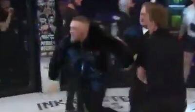Watch: Conor McGregor pushes referee, slaps MMA official