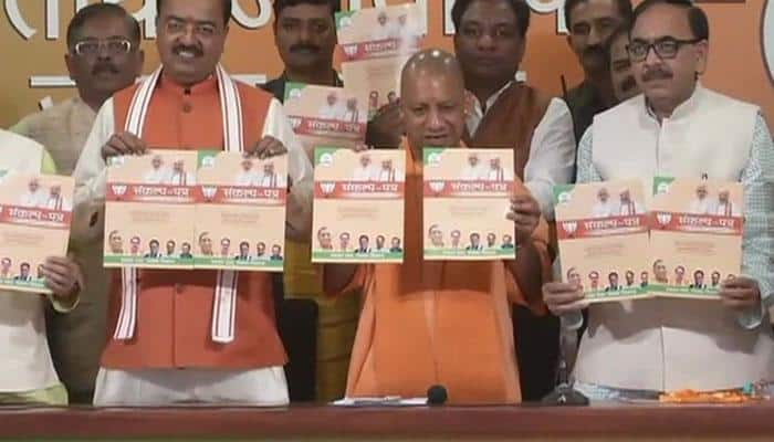 Adityanath highlights work done in UP as BJP releases manifesto for local body polls