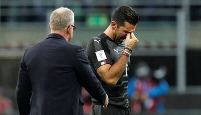 Teary Buffon ends international career after Italy's World Cup miss