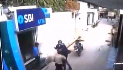 Security guard shot at for resisting bid to loot SBI ATM in Delhi's Majra Dabas - WATCH