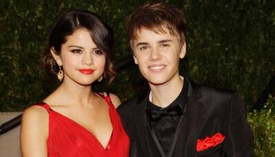 Selena Gomez confirms relationship with Bieber with a kiss