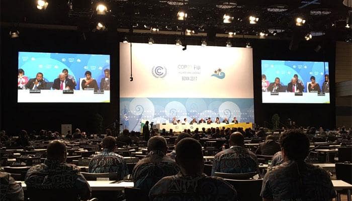 Amidst US shadow, nearly 200 nations pledge climate action