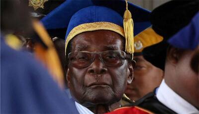 Elated Zimbabweans celebrate as Mugabe era fades