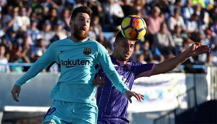 Barcelona hailed real winners of bruising Madrid derby