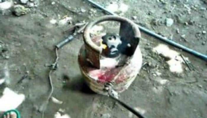 Gas cylinder blast rips apart portions of two-storied building