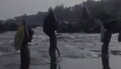 Students compelled to cross river to reach school in Odisha - Watch video