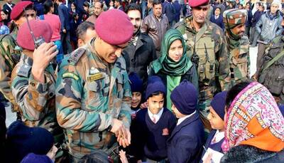 Lt Colonel Mahendra Singh Dhoni visits students in Srinagar - See pics
