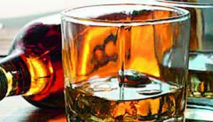 Two policemen dismissed from service under liquor law