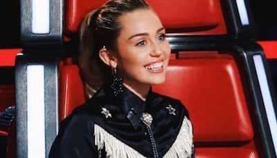 Miley Cyrus denies pregnancy, slams 'rude' fans