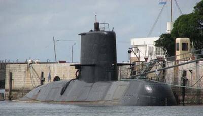 Searchers for Argentine submarine defy gale force winds on 11th day