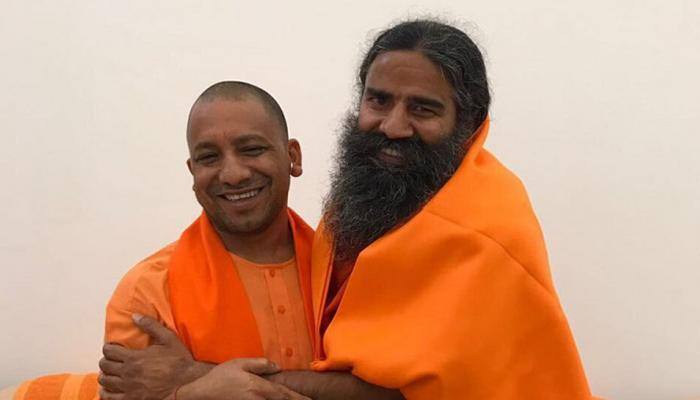 Ramdev meets Adityanath, discuss investment and Noida land scam