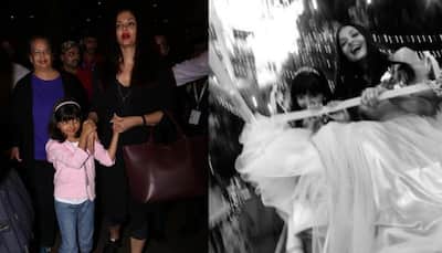 Aishwarya Rai Bachchan and daughter Aaradhya go twinning in red at a wedding function! Pics