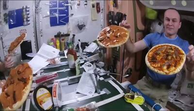 Zero gravity pizza, anyone? ISS astronauts show you how it's done - Watch