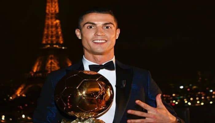 Cristiano Ronaldo pips Lionel Messi to win Ballon d'Or for joint-record fifth time
