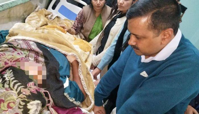 Arvind Kejriwal meets woman beaten for helping bust liquor racket