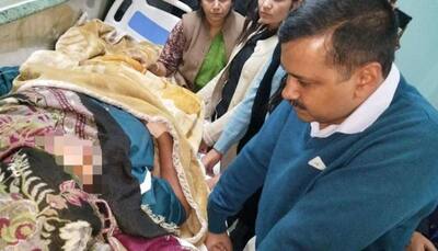 Arvind Kejriwal meets woman beaten for helping bust liquor racket