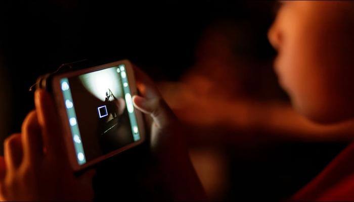 Watching TV, using smartphones before bed may cause weight gain in kids: Study
