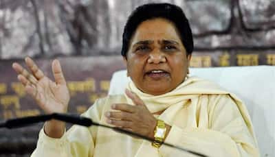 Conduct polls with ballot paper, Mayawati challenges BJP
