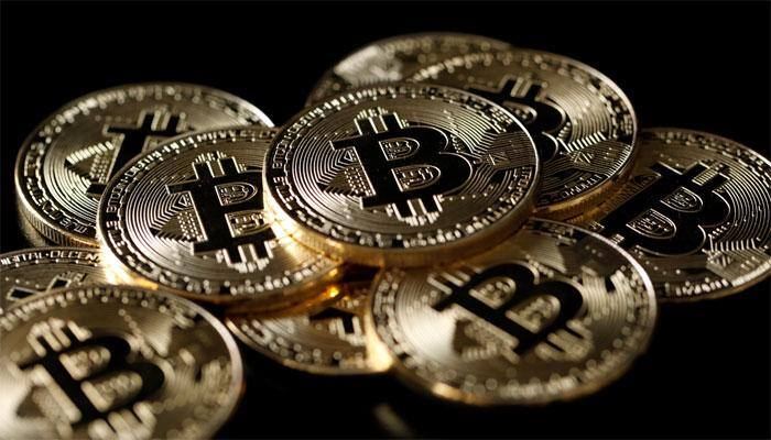 Bitcoin tops $18,000 in debut on major bourse