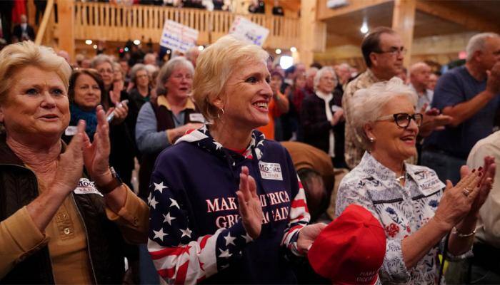 Voters head to polls in Alabama race with high stakes for Trump