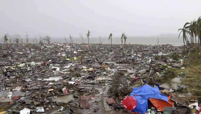 Landslides triggered by tropical storm Kai-Tak leaves 26 dead in central Philippines