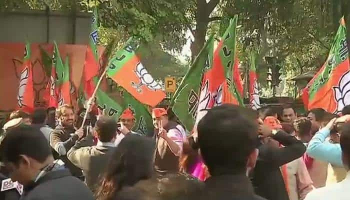 Assembly election 2017 results: BJP cadres across India celebrate as PM Modi flashes victory sign